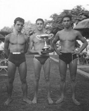 Rolando Schinasi with cup flanked by Gilbert Berengier and...